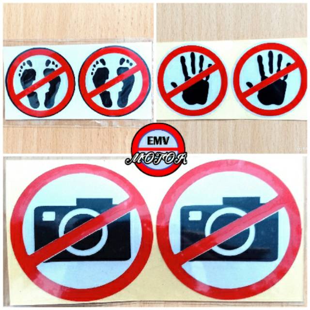 

Sticker no kaki,no tangan dan no kamera