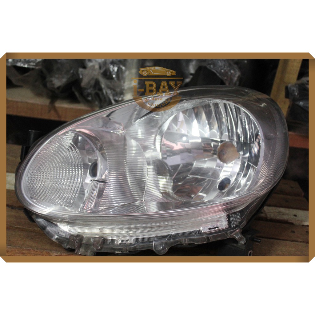 Headlamp Nissan March Lama