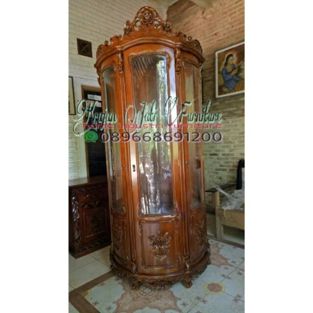 Lemari hias jati setengah lingkar