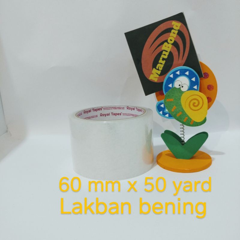 

Lakban isolasi bening 2 1/2 inch (60 mm) x 50 yard (45 meter) merk Royal Tapes atau merk Marubond
