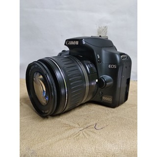 Canon 1000d dan lensa 18-55mm free memory card dan tas