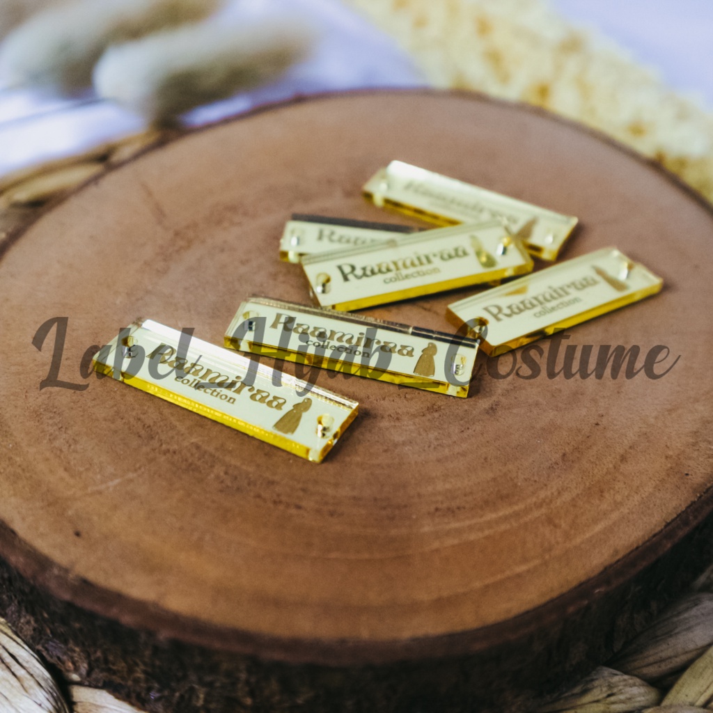 

label hijab | label baju | label akrilik | custom label | label jilbab | label cutting | label gold