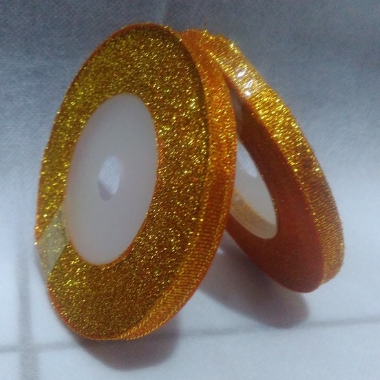 

Pita Glitter Orange Ukuran 1/4inch Per Roll