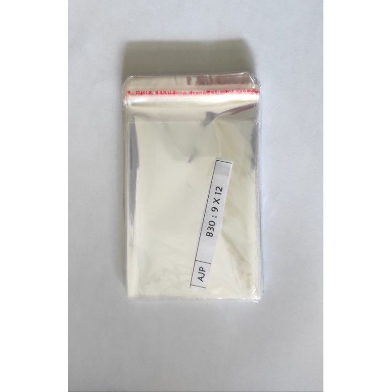 

PLASTIK OPP BENING PLUS PEREKAT 9 X 12 Cm