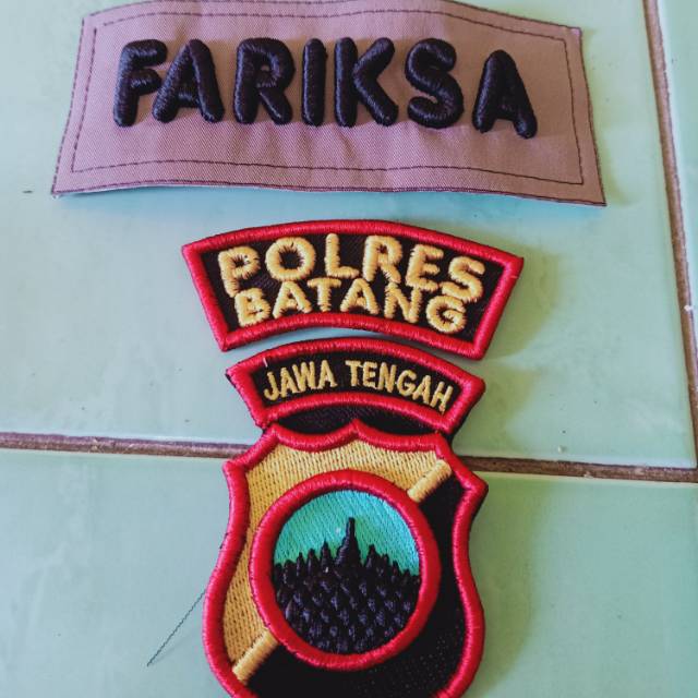 Bordir nama polri timbul