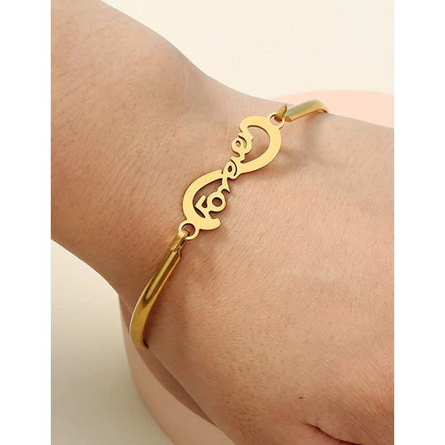 LRC Gelang Tangan Fashion Golden Color Stainless Steel Letter Alloy Hollow Bracelet P12362