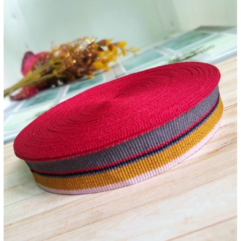 

rolan isi 15 meter,pita salur motif pelangi lebar 2cm.