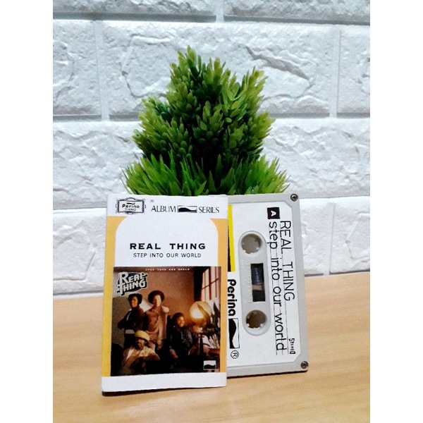 Kaset REAL THING - STEP INTO OUR WORLD