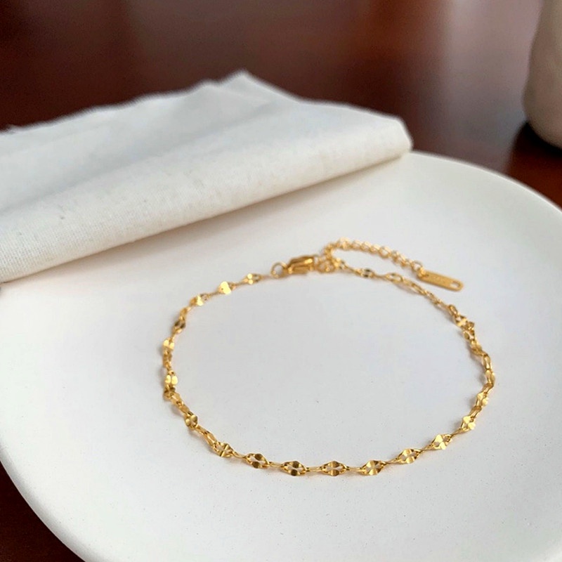 Gelang Kaki Titanium Anti Karat Riak Air Lapis Emas 18k Minimalis Korea Aksesoris Wanita
