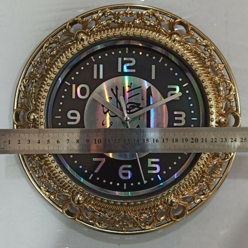 Jam dinding unik kaligrafi arab