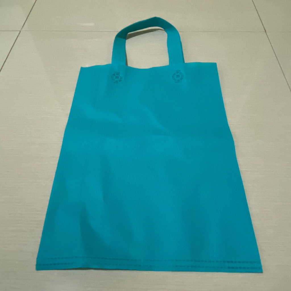 

Tas Handle Kain / Spunbond / Goodie Bag 30 X 40 (M)