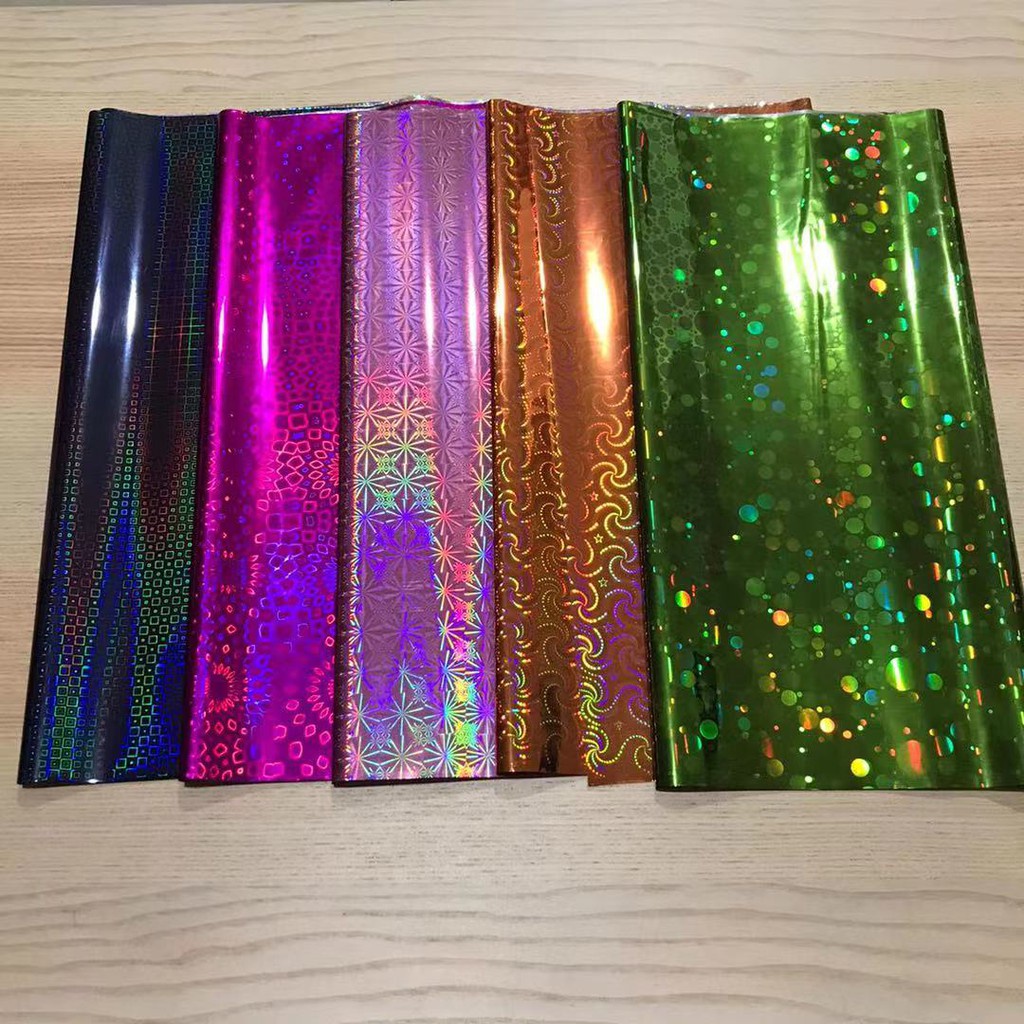 

(1 Slop / 10 Lbr ) Plastik Kado Hologram / Mengkilap