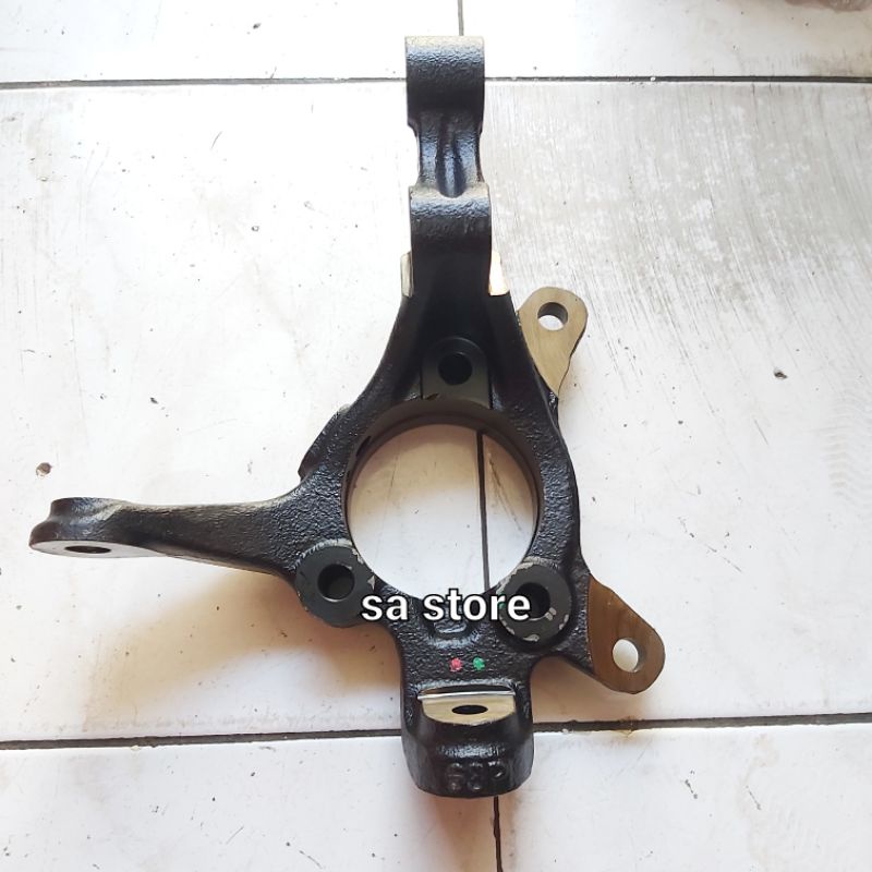 knuckle roda depan knakel as roda original Suzuki New Baleno