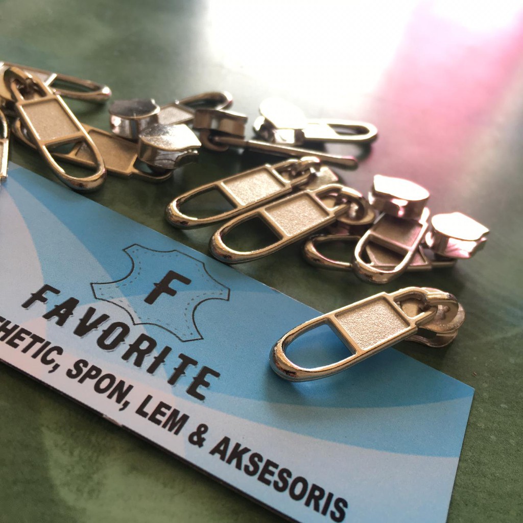 Kepala Resleting No 5 Model Gembok Nikel / Silver Murah HARGA = RP. 220/PCS MINIMAL 100PCS