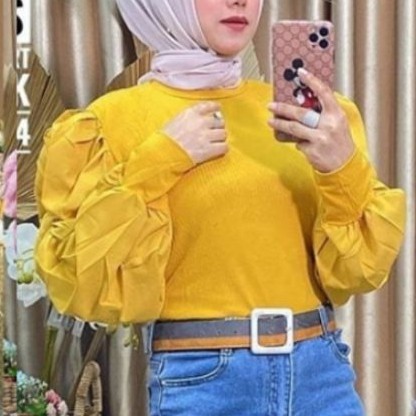 

Blouse Rajut balonie Tag label CA