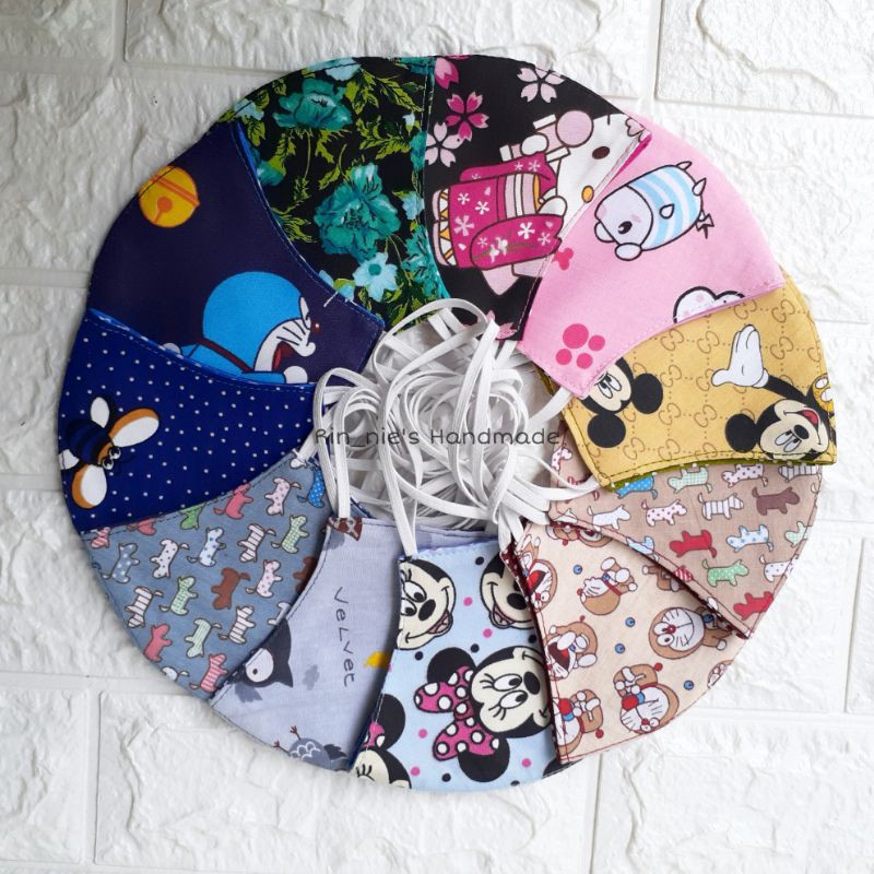 Masker Kain anak tanggung TK - SD Kain katun bolak balik motif kartun