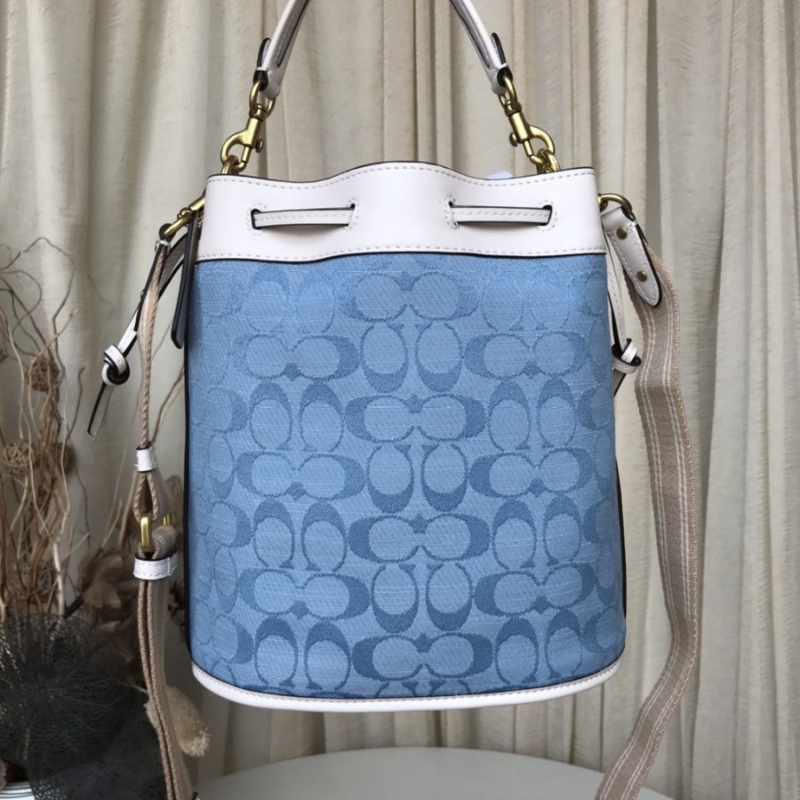 TAS WANITA COACH FIELD BUCKET BAG IN SIGNATURE CHAMBRAY