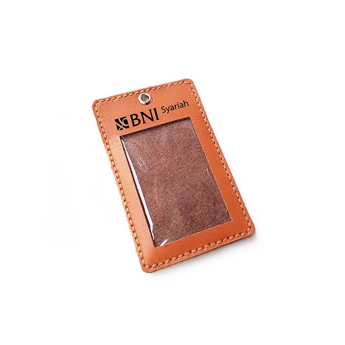 

Name Tag Id Kulit Asli Sapi Logo BNI Syariah Warna Tan GARANSI 1 TAHUN - Tali Id Card. Gantungan Id