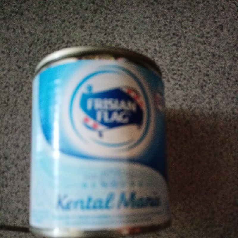 

susu kaleng Frisian flag