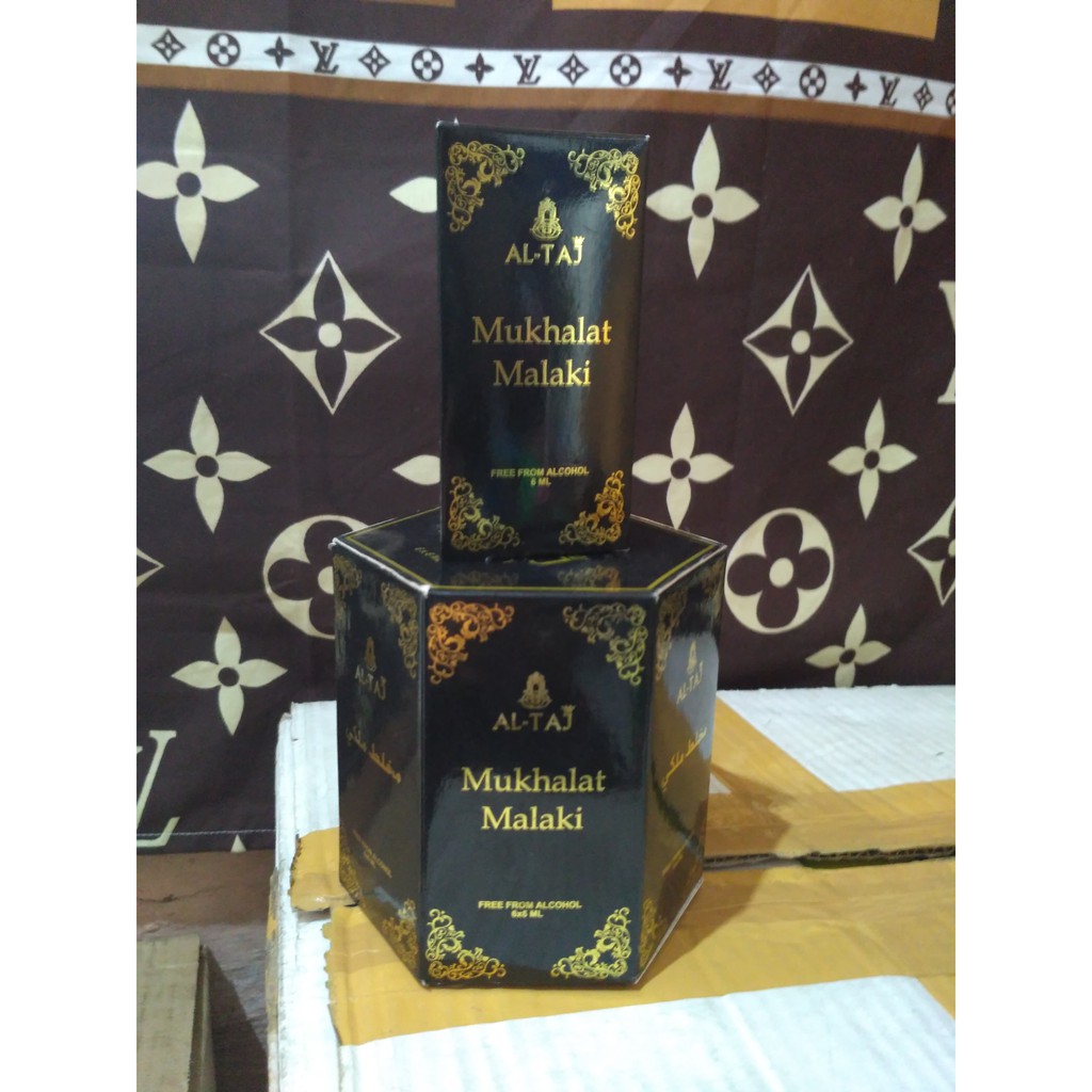 PARFUM AL TAJ ORIGINAL AROMA MUKHALAT MALIKI
