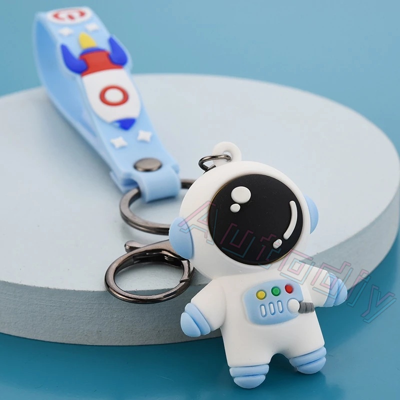 Kartun Luar Angkasa Astronot Roket Planet Gantungan Kunci Lucu 3D Spaceman Figure Lanyard Cosmonaut Keyrings Silicone Trinket Props Bag Doll Key