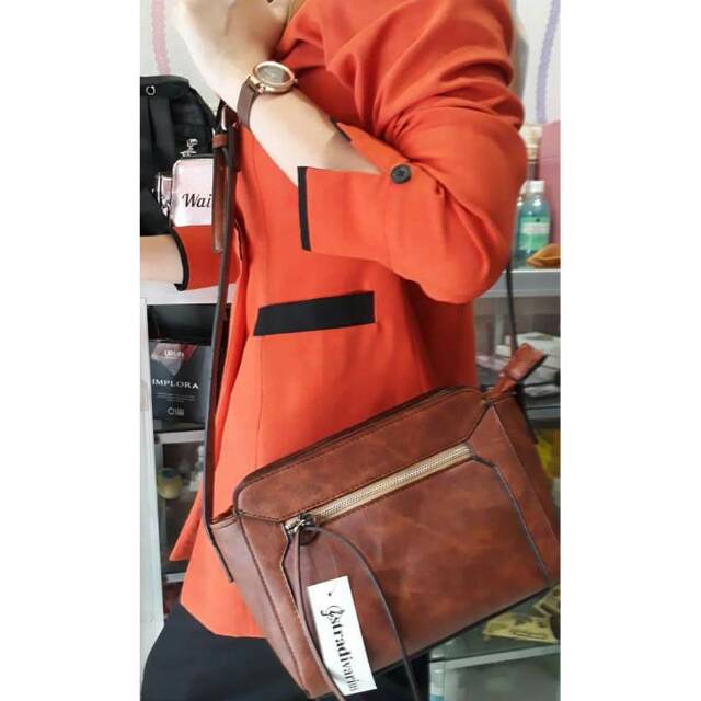 Tas slempang fosil