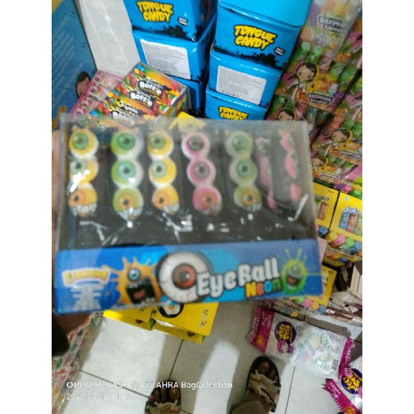 

permen bentuk mata isi 30 .