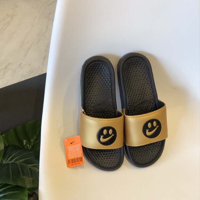 nike benassi smiley face