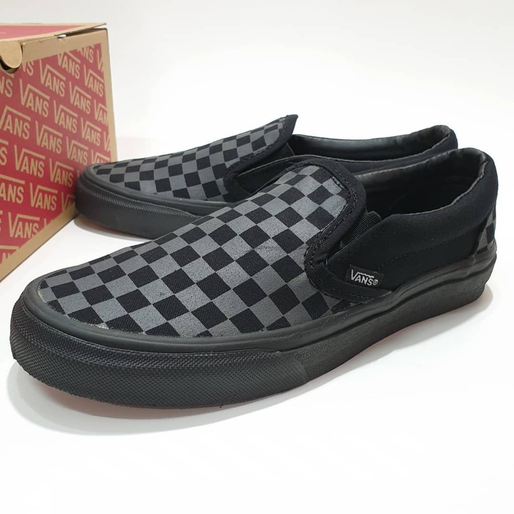 vans black and grey slip on