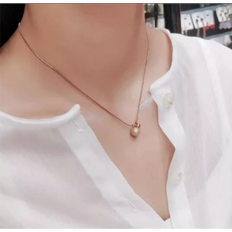 Kalung Rantai Belut Liontin Bola Pasir Titanium