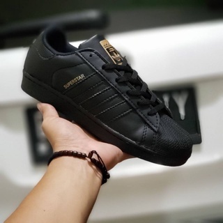black superstar sneakers