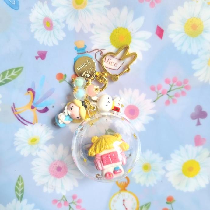 ACC TAS WANITA Alice in wonderland globe bagcharm