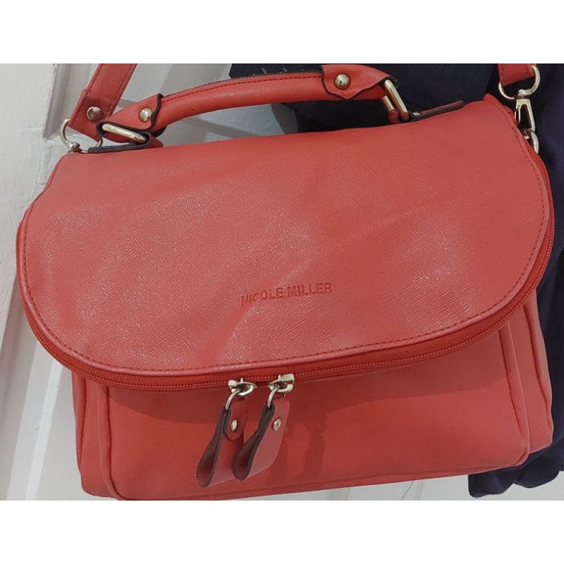 Tas sling Nicole Miller