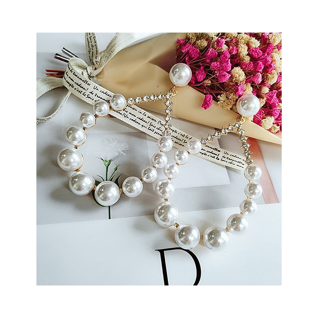 LRC Anting Fashion White Drop-shaped Pearl Earrings D64427