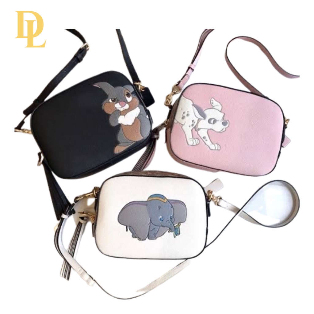 DISNEY X COACH CORNER CAMERA SLING BAG WITH DUMBO (COACH 69252)