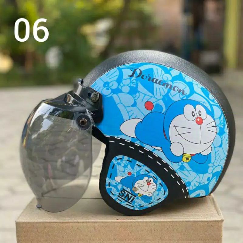 HELM BOGO DEWASA MOTIF DORAEMON COD MAKASSAR FREE BOX