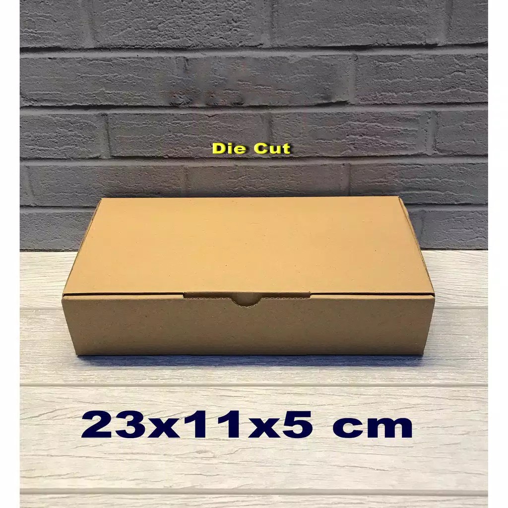 

Kardus 23 x 11 x 5 cm..... Die Cut