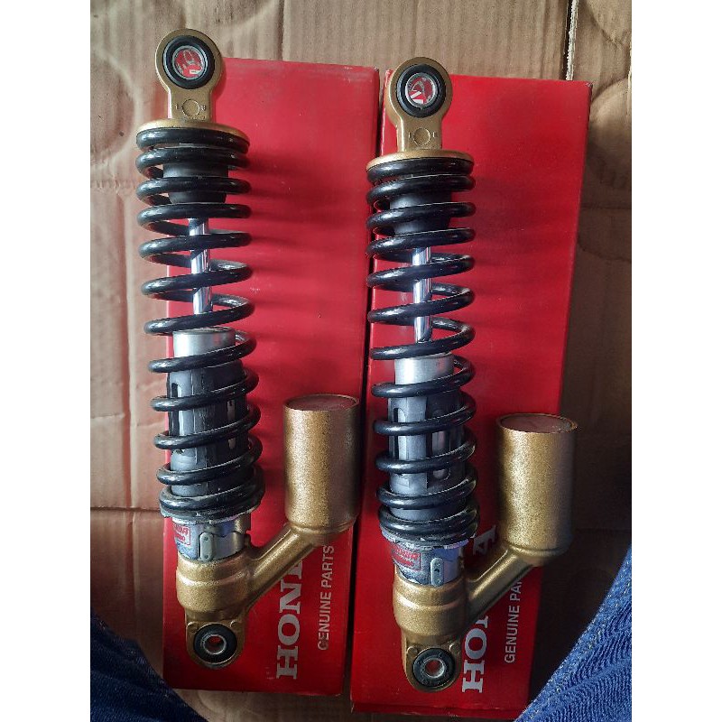 shock belakang tiger revo original