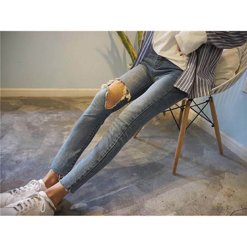  Celana  Panjang  Jeans  Wanita  Model Lubang Besar Warna Biru 