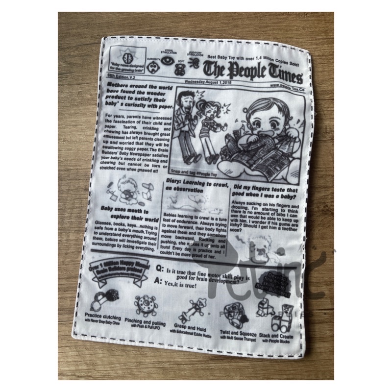 Newspaper atau koran rustling toy (bunyi kresek kresek)