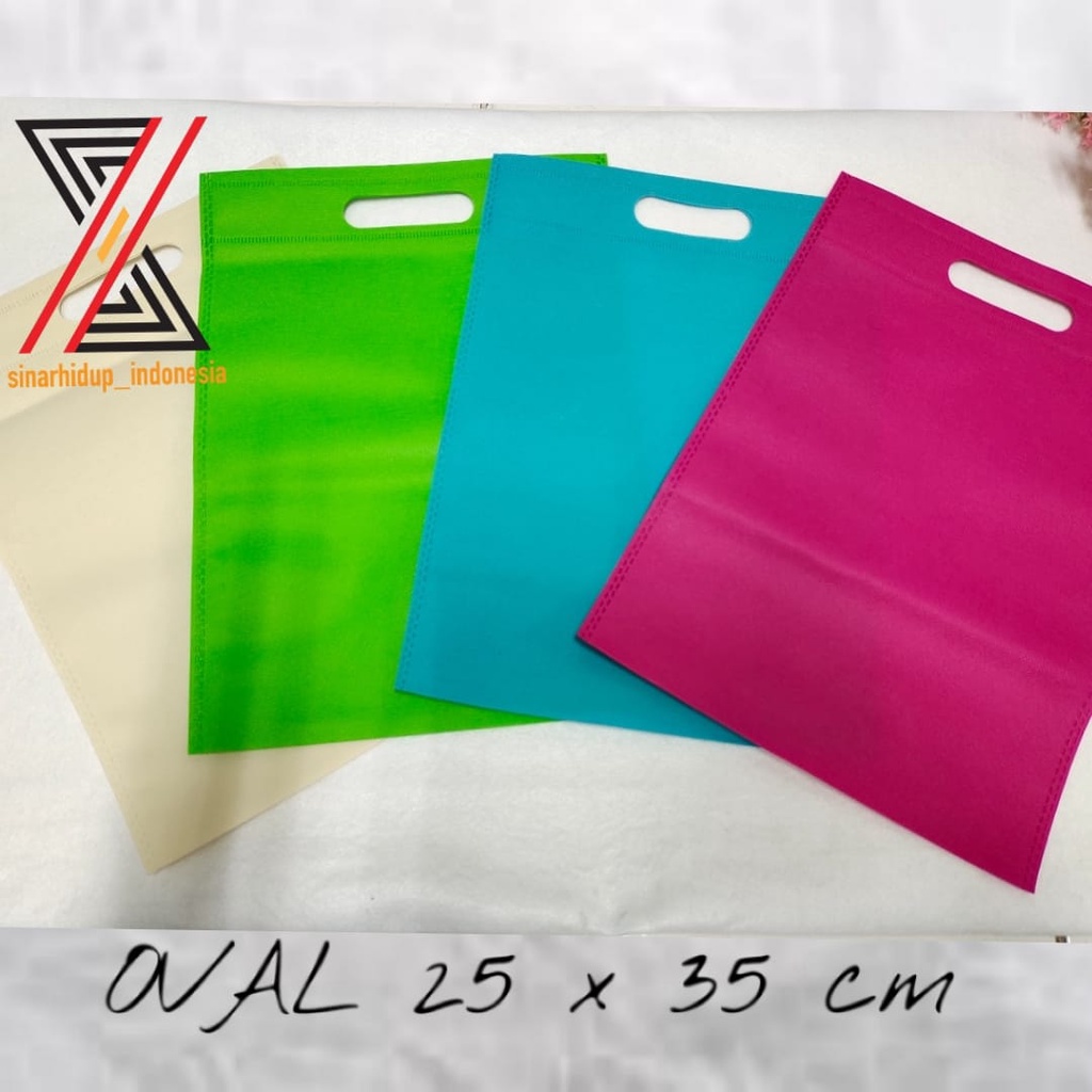

Goodie Bag Tas Belanja Oval 25x35 Spunbond Tote Bag Souvenir Weding Hajatan Perkodi ( 20 Pcs )