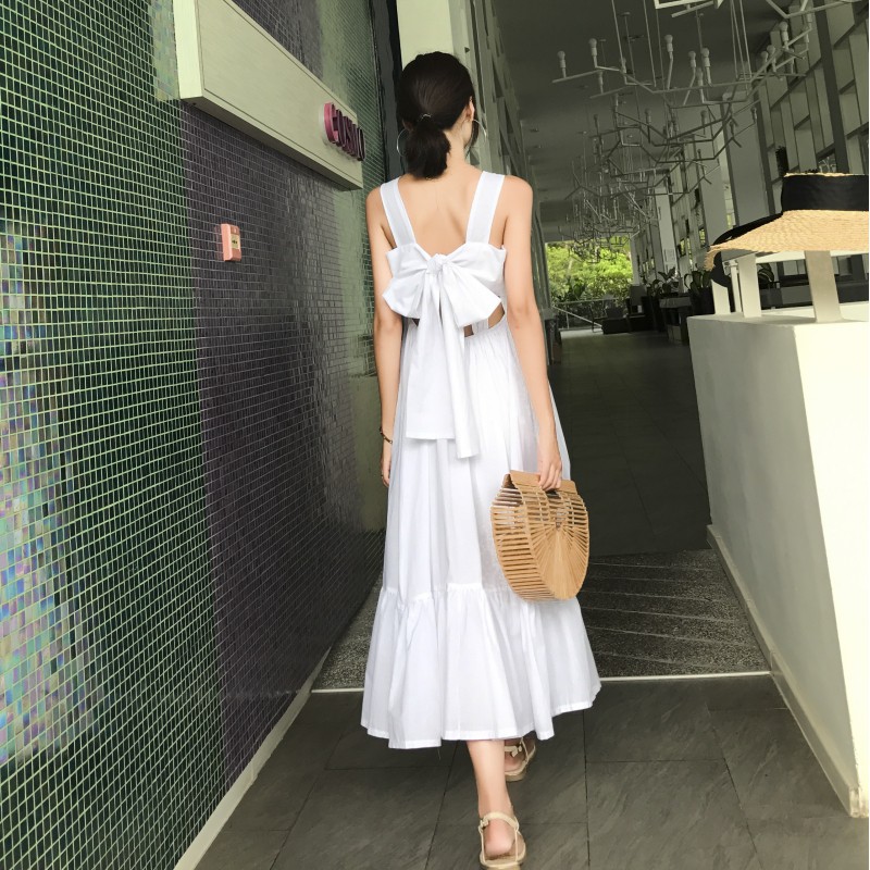 white sleeveless summer dress