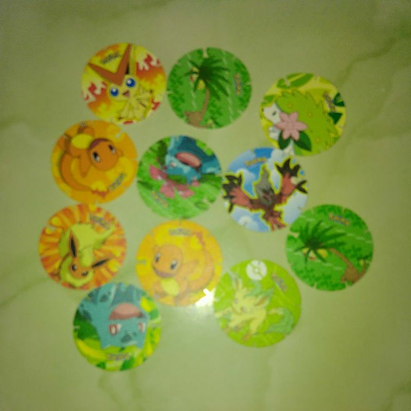 13-08-2021 tazos baru pokemon charmander Pokemon coin coins pokemon Go Pikachu chiki tazos Spin