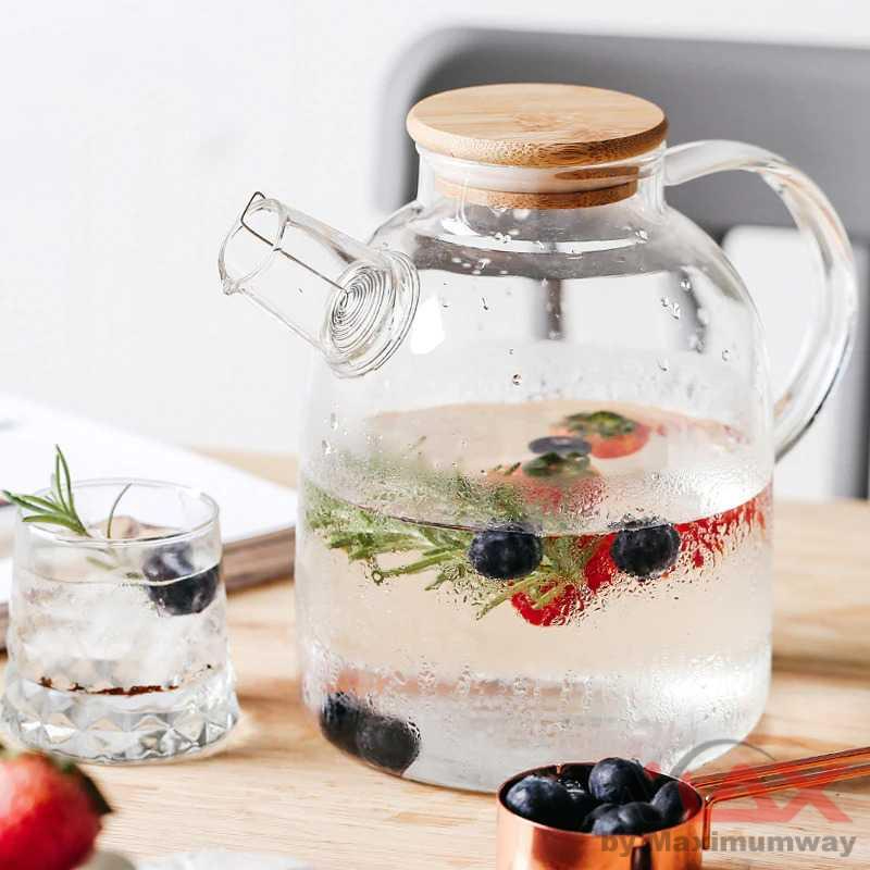 Teko Es jeruk dgn saringan es 1,5 liter bisa untuk masak air panas Pitcher Teh Chinese Glass 1.5L ceret ketel kirstal kaca crystal Ketel Dingin Kapasitas Besar Transparan Thickened Transparent Large-capacity Cold Kettle with Bamboo Lid Kettle Juice Kettle