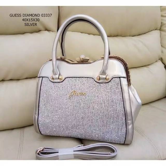 Tas Guess Silver