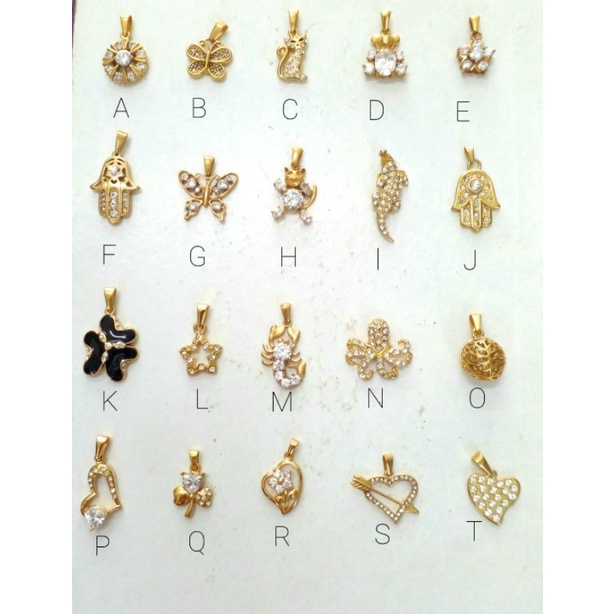 liontin titanium gold mata putih