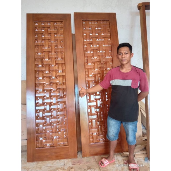 pintu utama rumah pintu kupu tarung kayu jati mebel Jepara