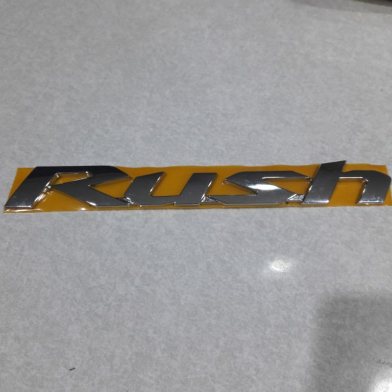 Emblem / logo mobil Rush ORIGINAL Lelangan