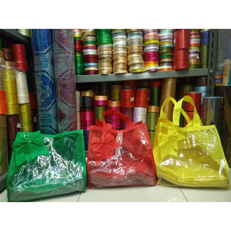 

tas spunbond campur mika buat nasi kotak 25 isi 12 pcs