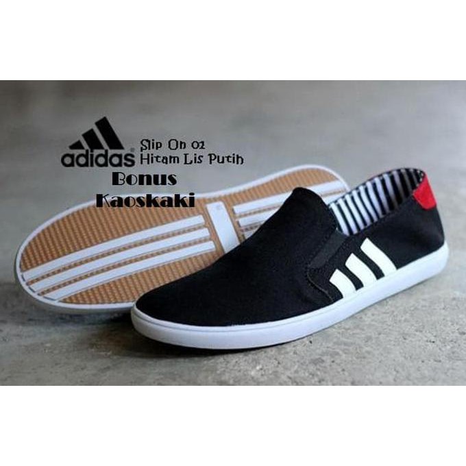 NOTED GRATIS ONGKIR SEPATU PRIA ADIDAS CASUAL SLIP ON KANVAS SLIGHT HITAM PUTIH 
